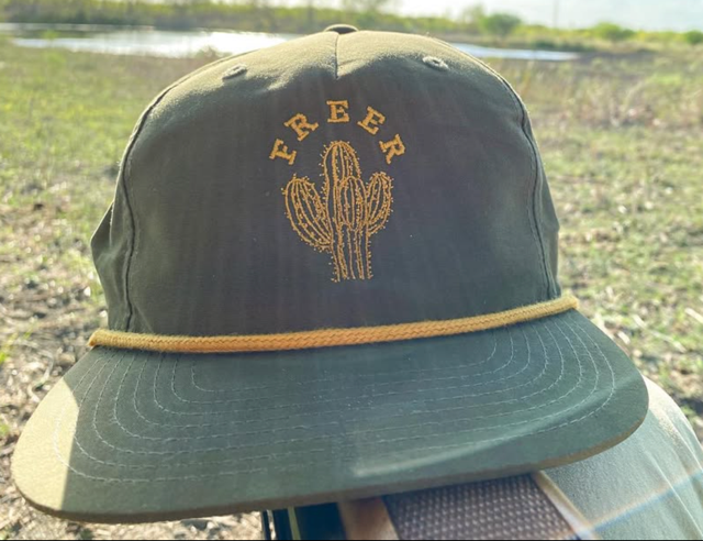 Olive and gold Freer cactus cap outdoors